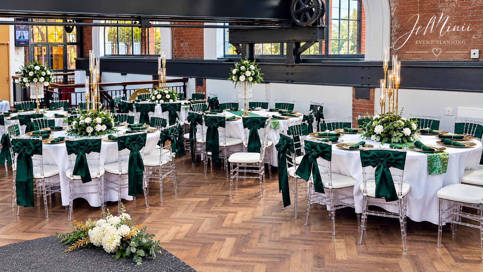 Victor's party ballroom with decorated tables, arched windows and exposed brick walls, styled by Jeminii Event Styling in Manchester